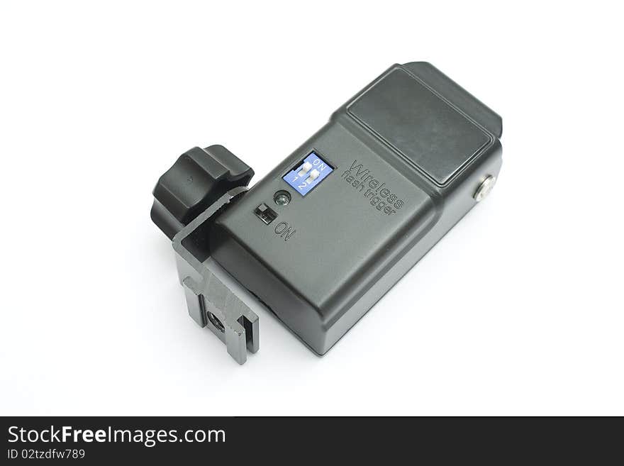 One black wireless flash receiver for a SLR camera