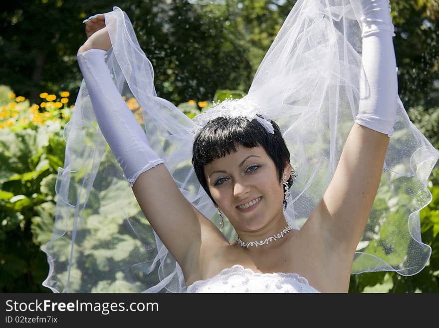 Beautiful and happy bride with outdoors. Beautiful and happy bride with outdoors.