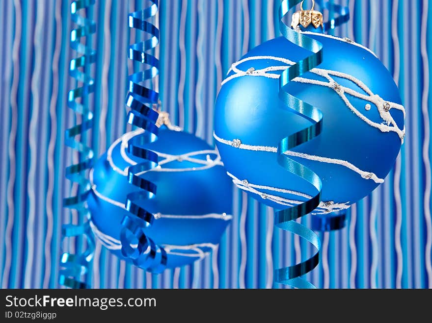 Christmas decoration from two blue balls on blue background. Christmas decoration from two blue balls on blue background