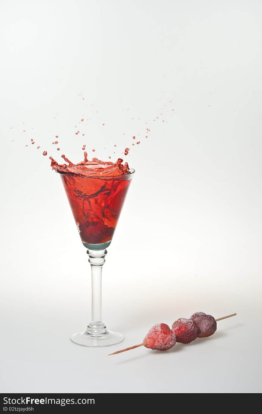 A refreshing splash of a strawberry drink, it can be alcoholic or just a simple drink. A refreshing splash of a strawberry drink, it can be alcoholic or just a simple drink