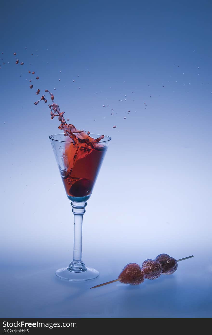 A refreshing splash of a strawberry drink, it can be alcoholic or just a simple drink. A refreshing splash of a strawberry drink, it can be alcoholic or just a simple drink