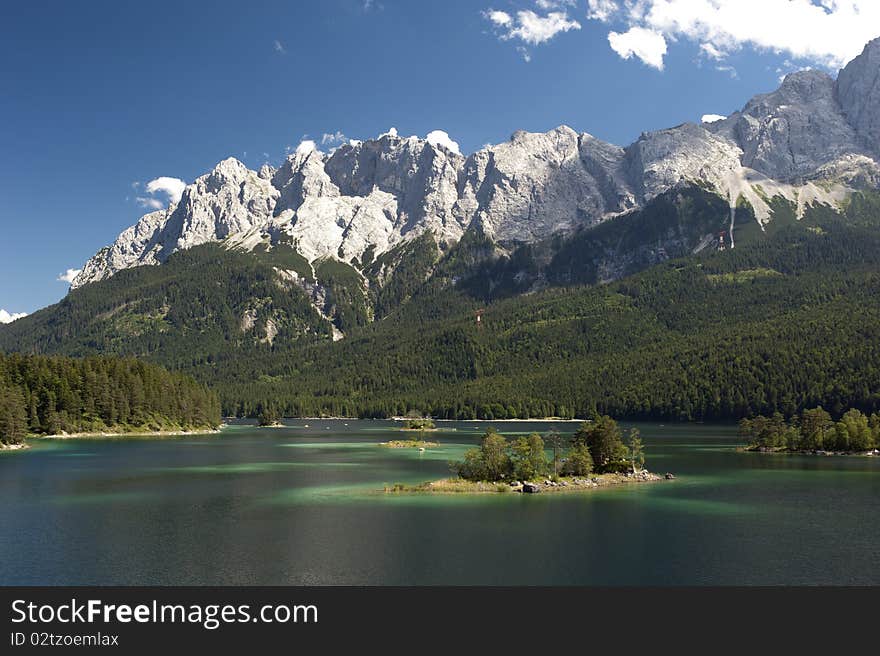 Lake named Eibsee in upper bavaria germany at the alps mountains. Lake named Eibsee in upper bavaria germany at the alps mountains