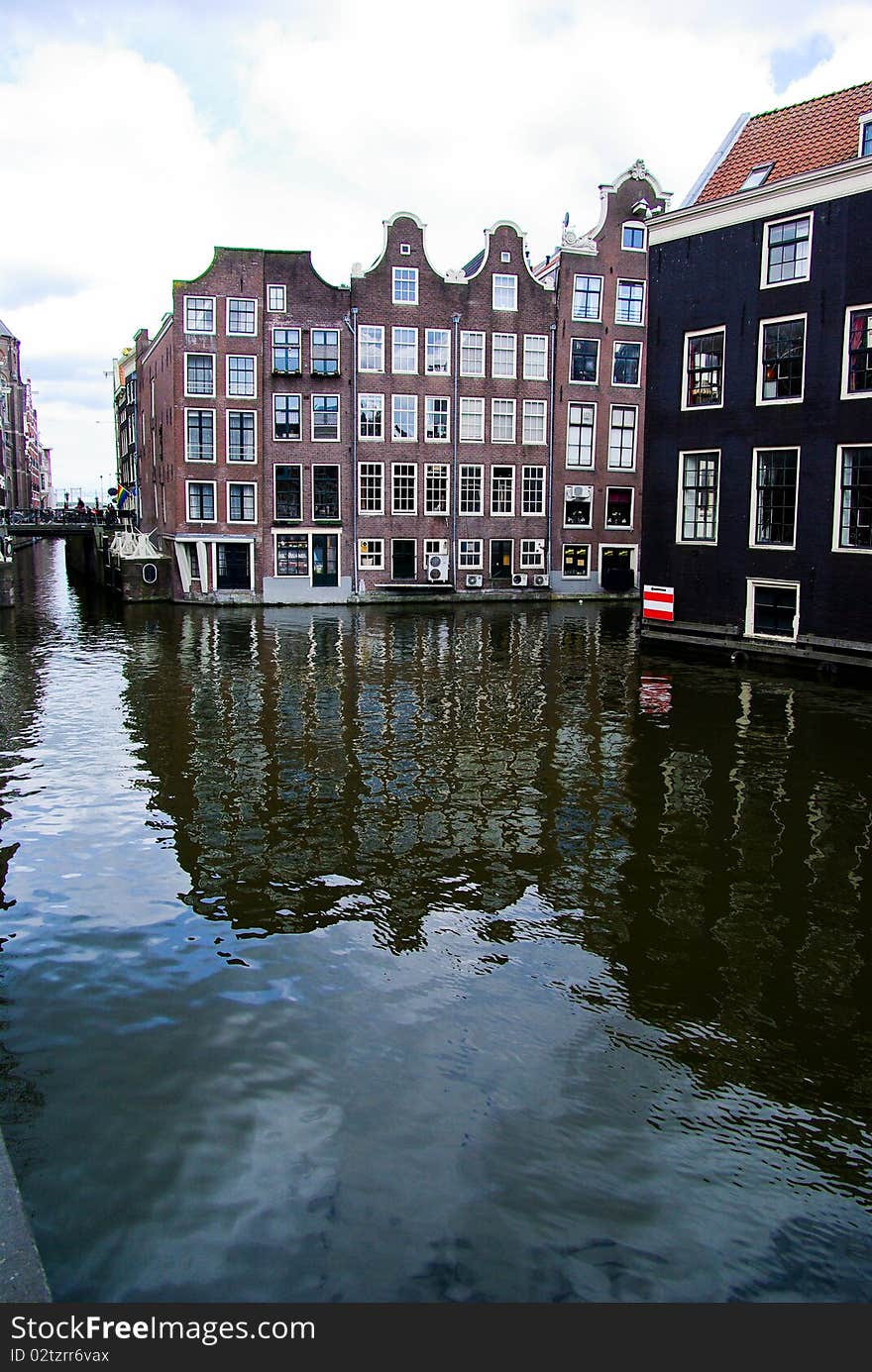 Canal with houses in Amsterdam