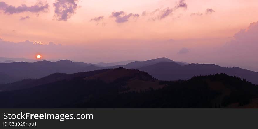 Beauty purple sunset on mountain