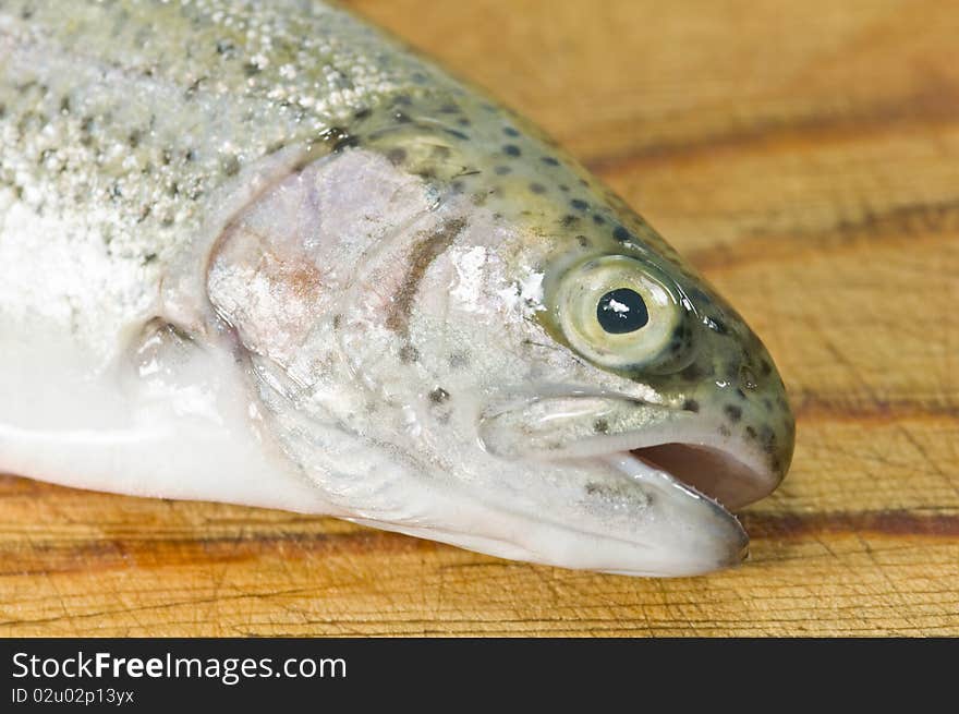 Fresh trout on wood table