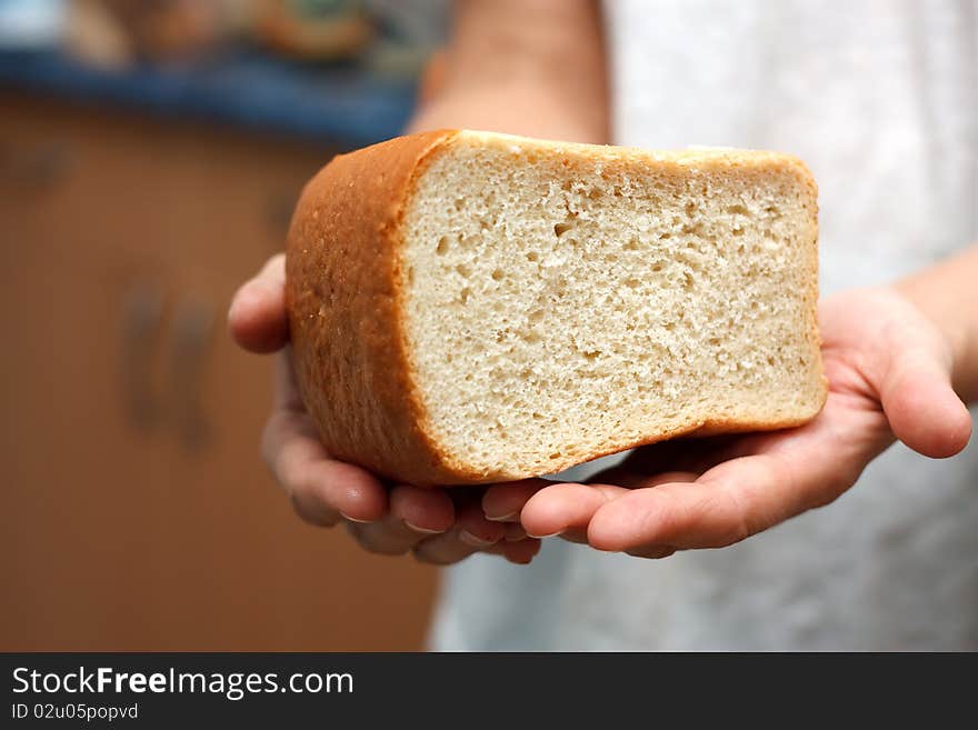 The bread in two hands. The bread in two hands.