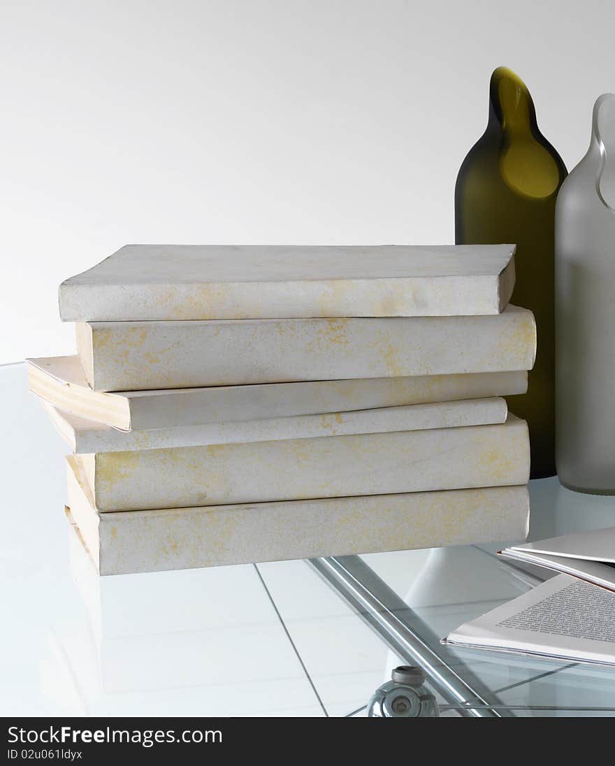 Stack books on the glass table