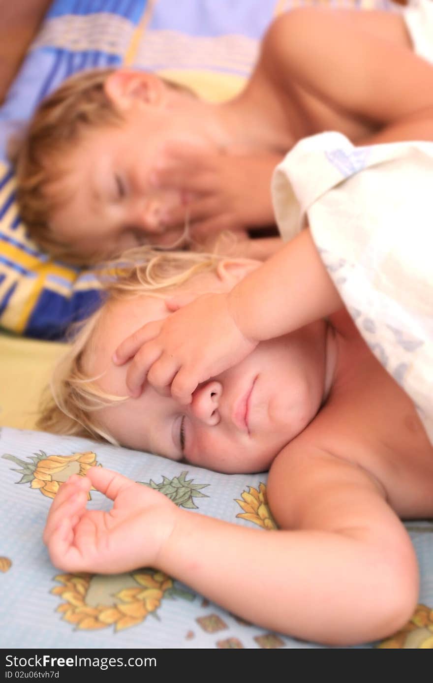 Portrait of two sleeping kids