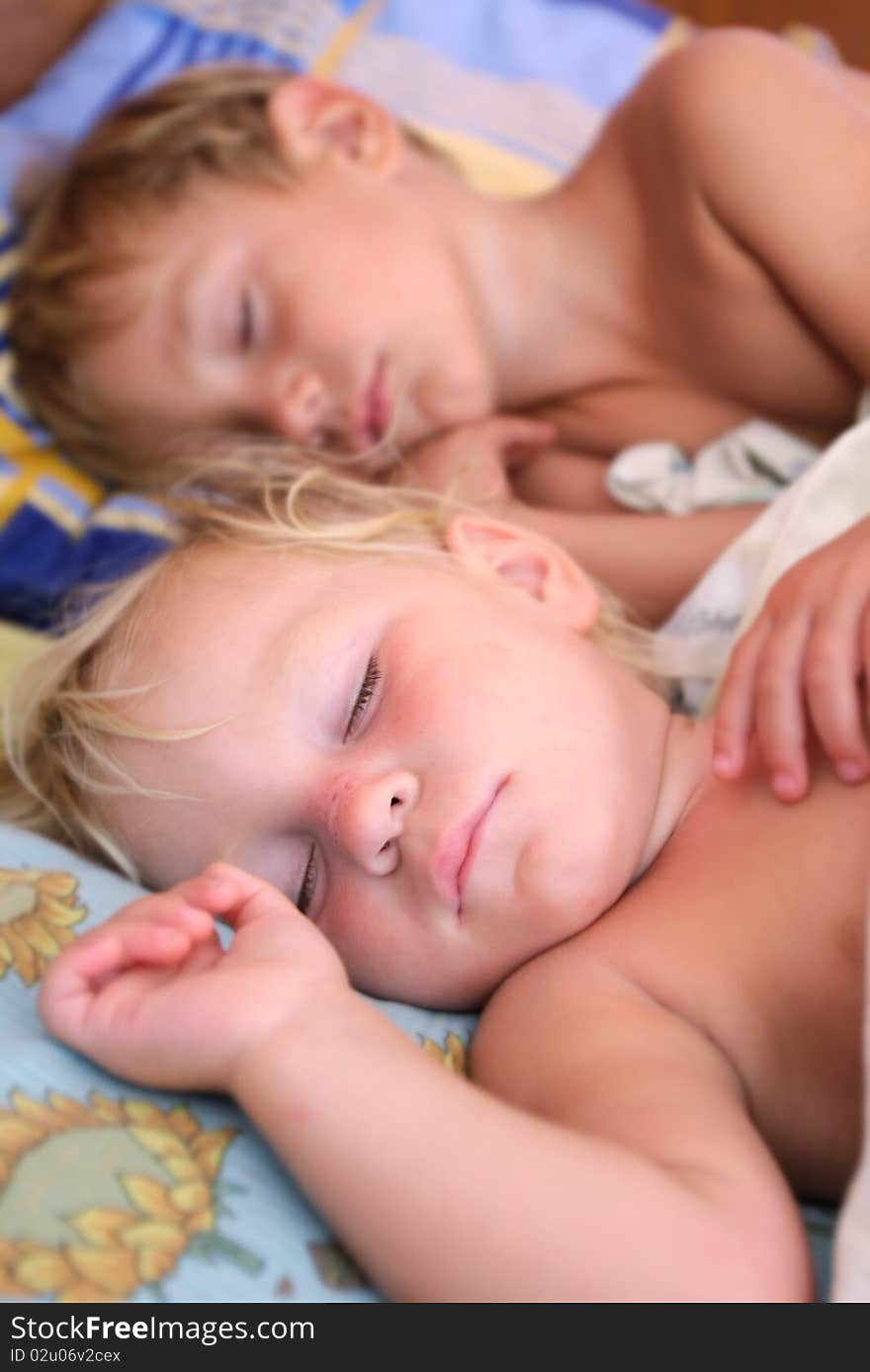 Portrait of two sleeping kids