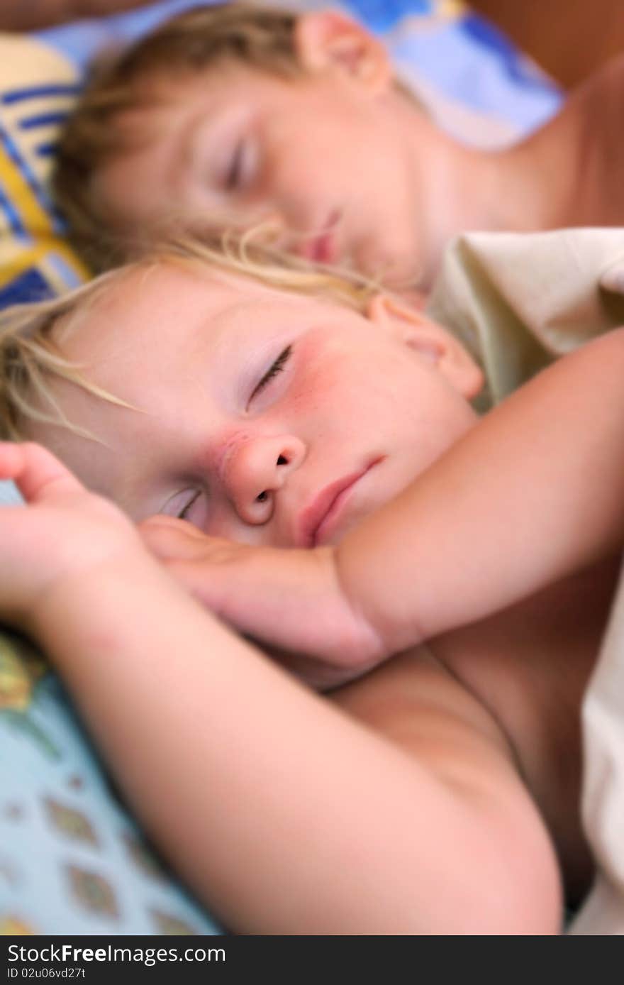 Portrait of two sleeping kids