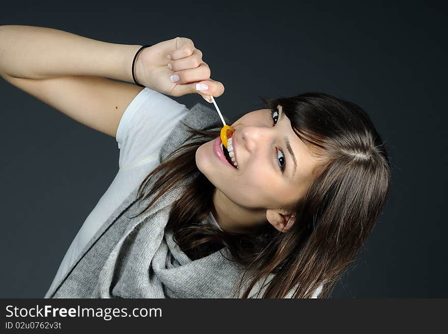 Teenager eating sweets