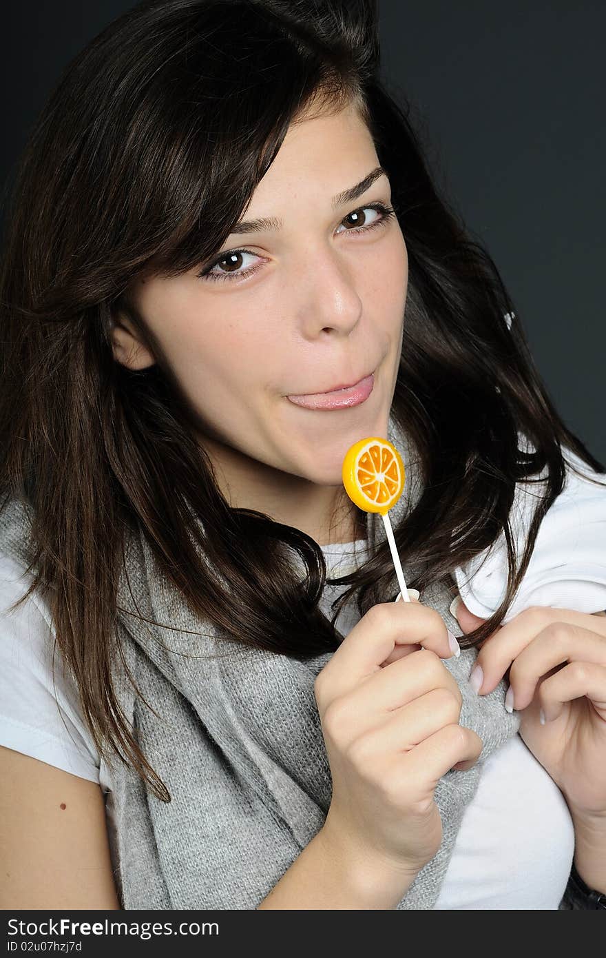 Teen eating delicious sweet