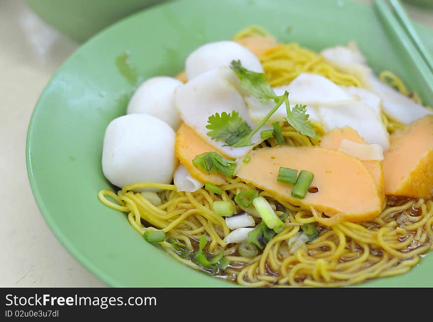 Delicious looking Chinese style fishball noodles. Suitable for concepts such as food and beverage, and travel and cuisine.