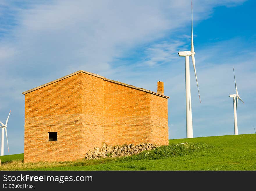 Wind farm with wind turbines in a beautiful landscape. Wind farm with wind turbines in a beautiful landscape