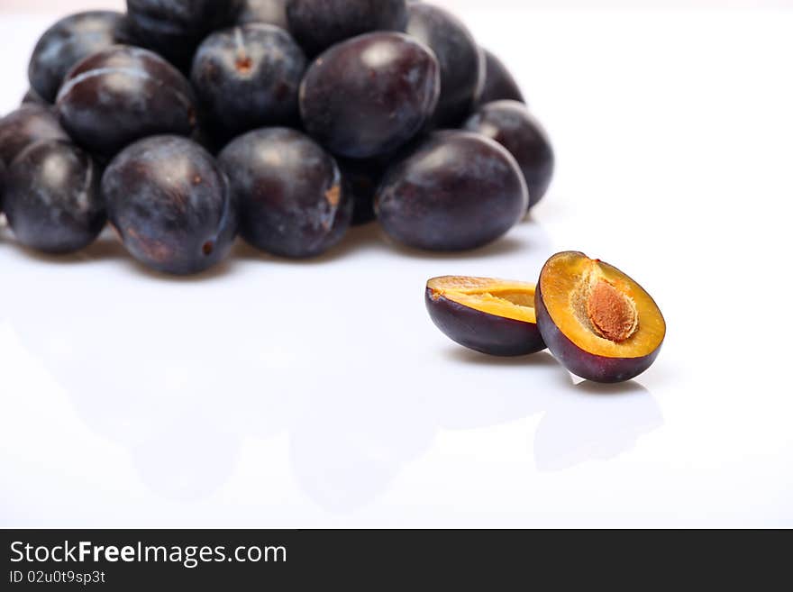 Fresh plums on a white background. Fresh plums on a white background