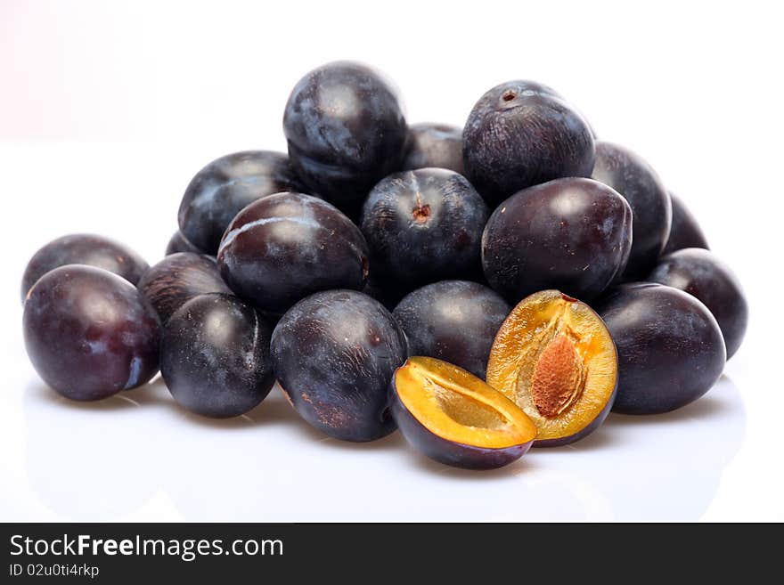 Fresh plums on a white background. Fresh plums on a white background