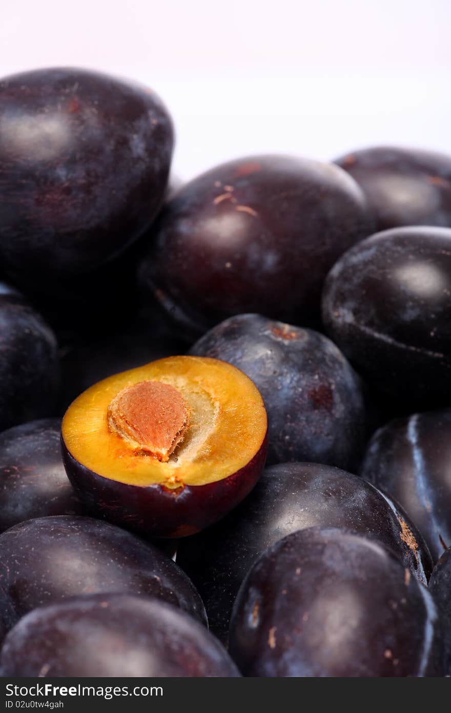 Fresh plums on a white background. Fresh plums on a white background