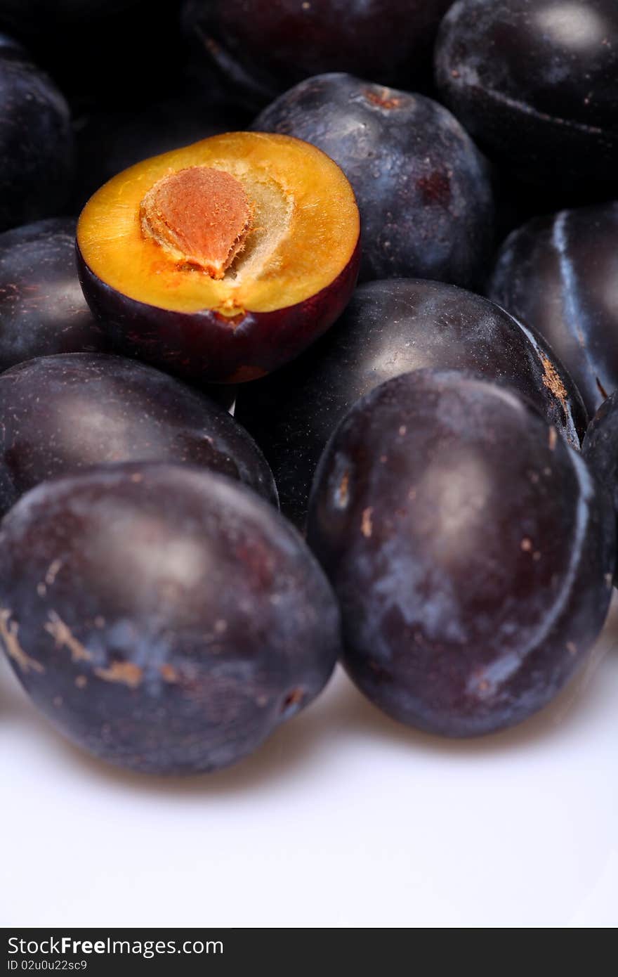 Fresh plums on a white background. Fresh plums on a white background