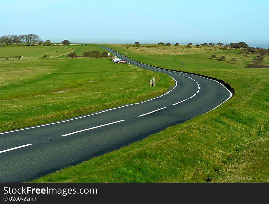 A road curve along ocean coast