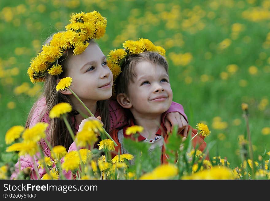 Brother And Sister With Dandelion Garlands