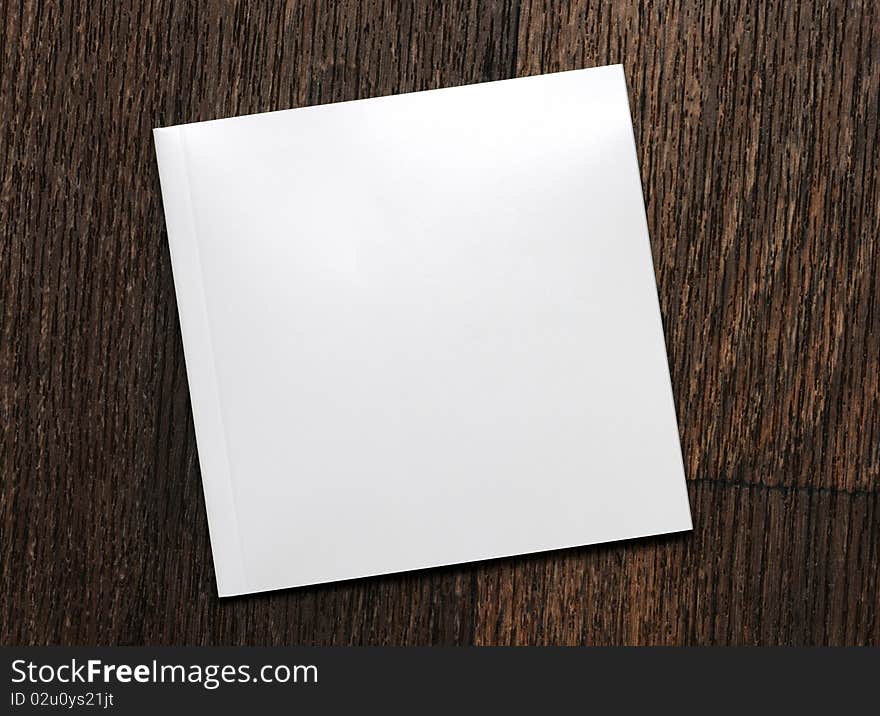 White-book on a wooden background /10