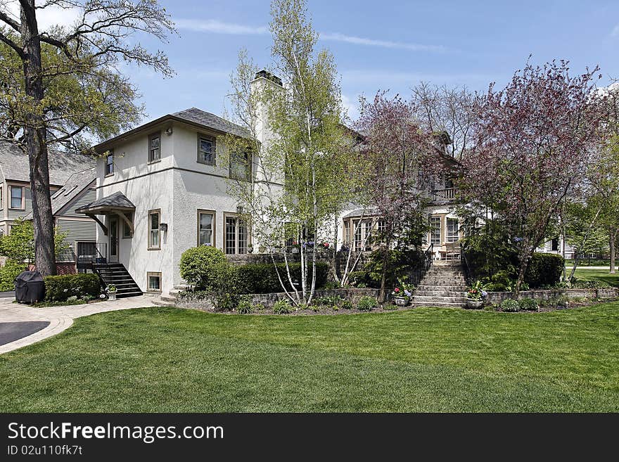 Rear view of luxury home in springtime