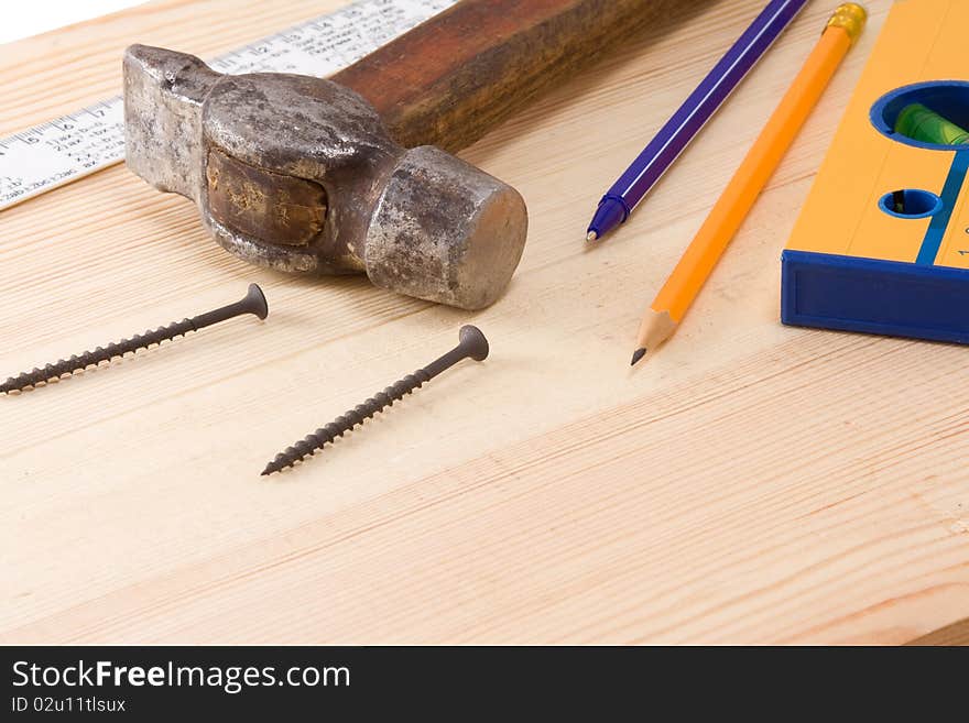 Set of tools on wood board