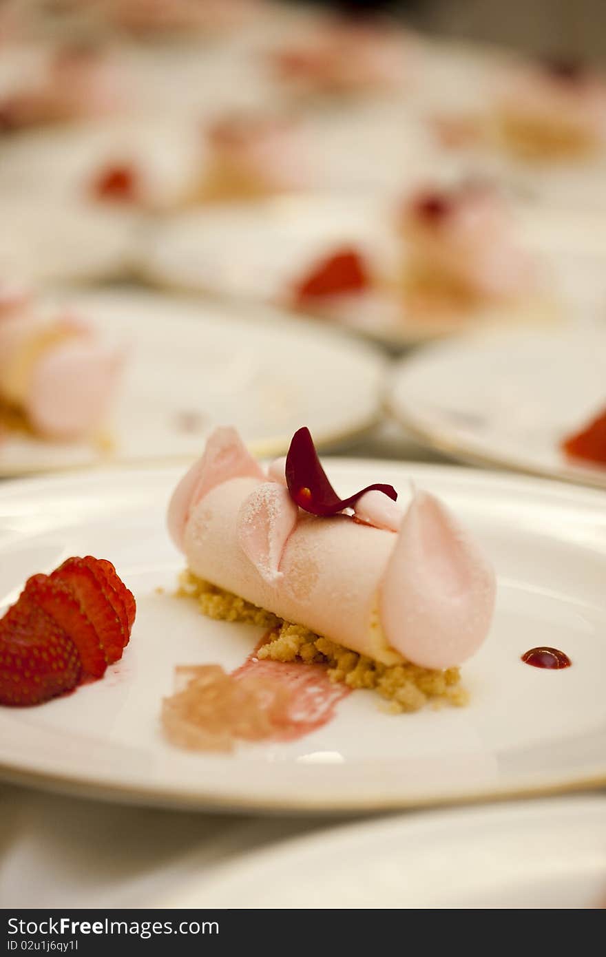 Strawberry meringue rose water plated desserts. Strawberry meringue rose water plated desserts