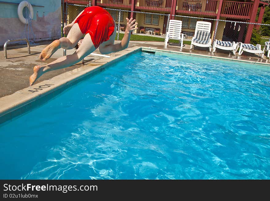 Child Has Fun In The Pool