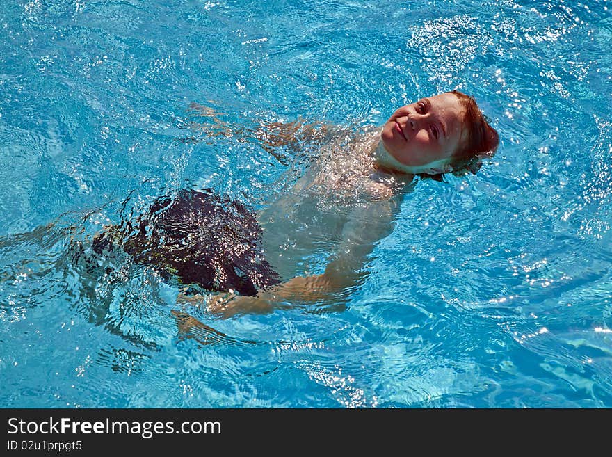 Child has fun in the pool