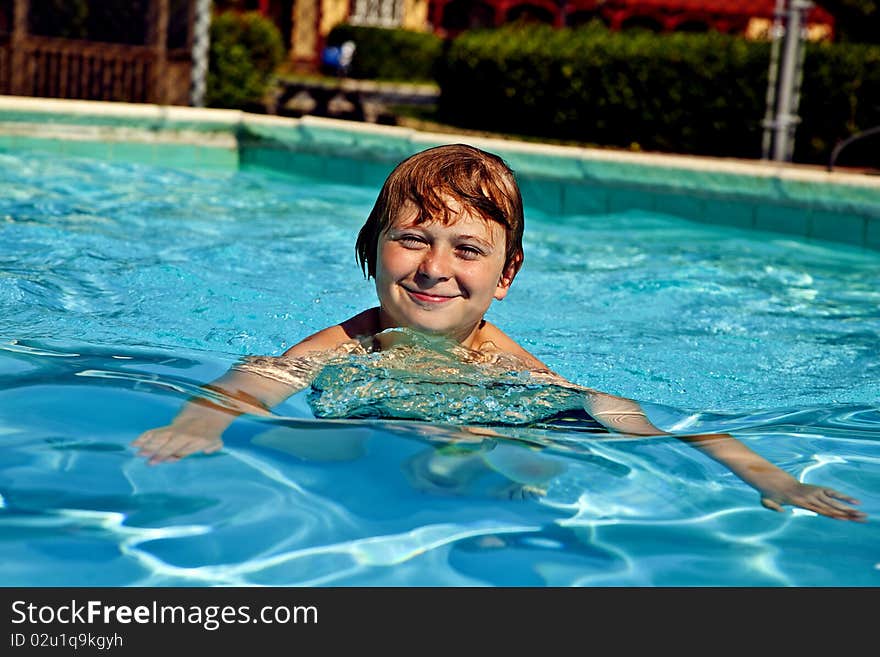 Child has fun in the pool