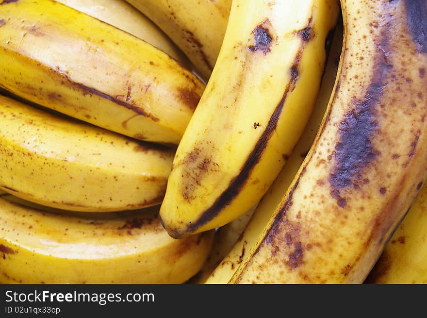 Banana bunch on the turn in a market stall