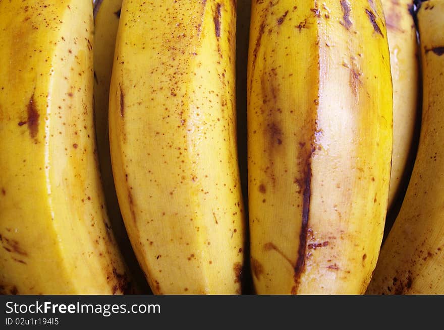 Banana bunch on the turn in a market stall