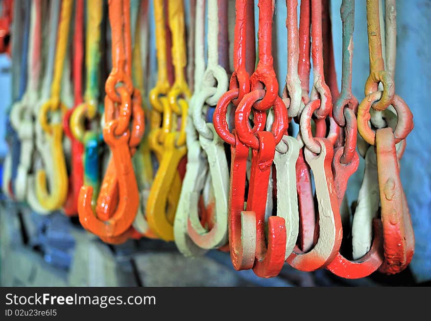 Colorful painted clamps used in painting yard