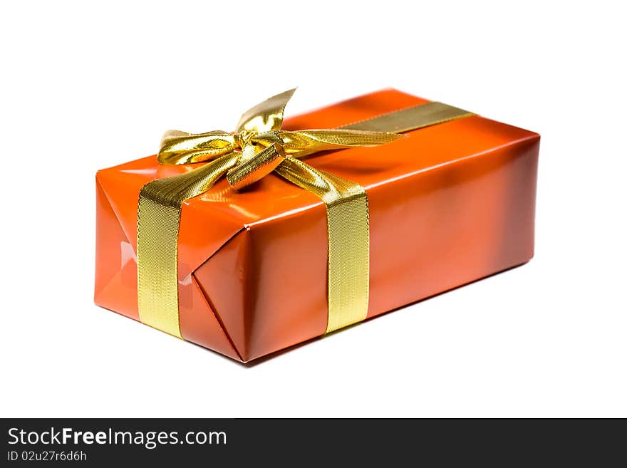 Gift box with golden ribbon,isolated on the white