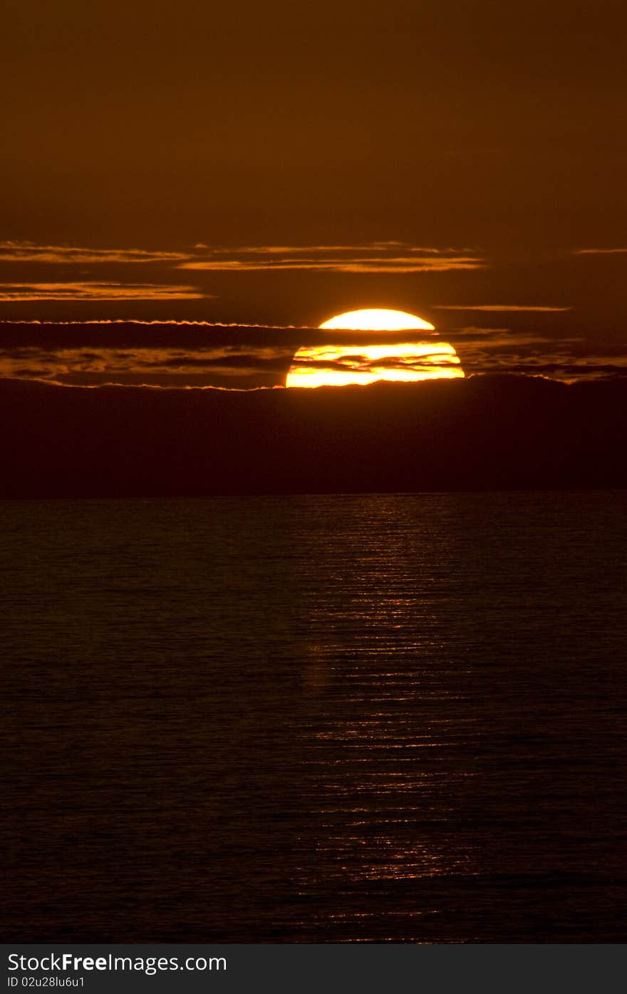 Sunset with Clouds over the open sea near Sumburgh Shetland. Sunset with Clouds over the open sea near Sumburgh Shetland