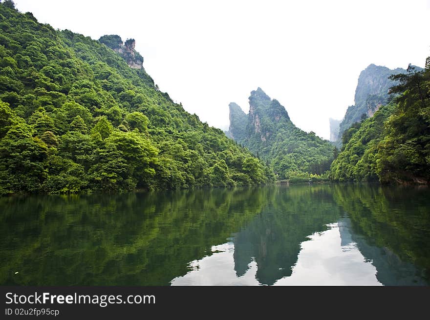 A World Natural Heritage in South China, Zhangjiajie is consisted of more than 3,000 quartz sandstone pillars, and many Karst caves. A World Natural Heritage in South China, Zhangjiajie is consisted of more than 3,000 quartz sandstone pillars, and many Karst caves.