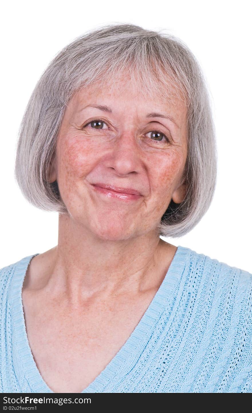 Smiling senior woman wearing blue sweater. Smiling senior woman wearing blue sweater