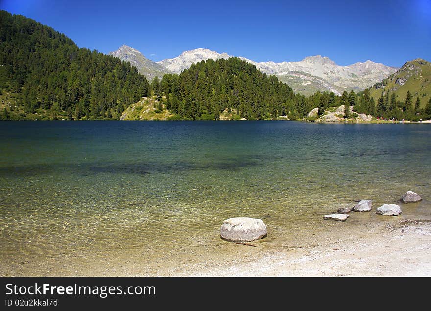 Alpine lake Cavloc Engadine in Switzerland