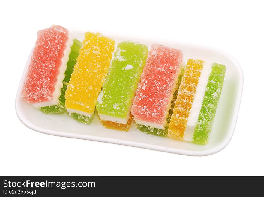 Fruit candy slices on the white