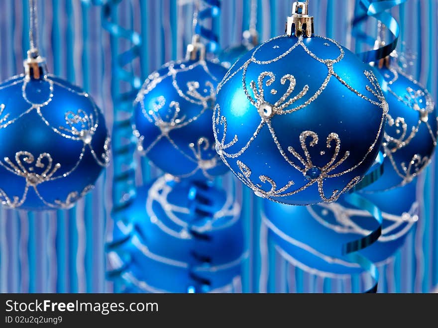 Christmas background from balls. Blue background. Christmas background from balls. Blue background