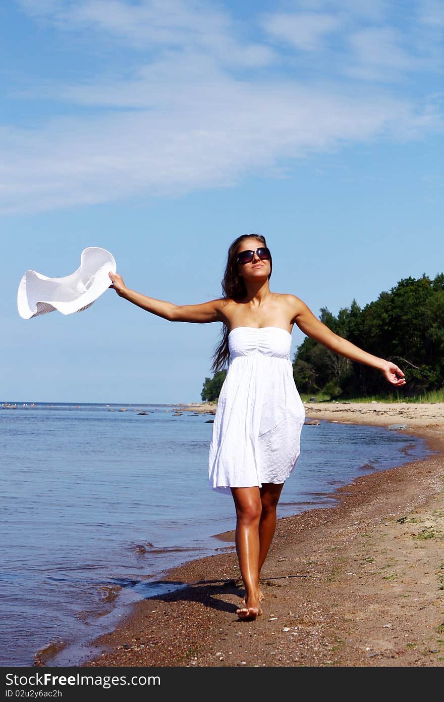 Sexy and beautiful woman on the beach