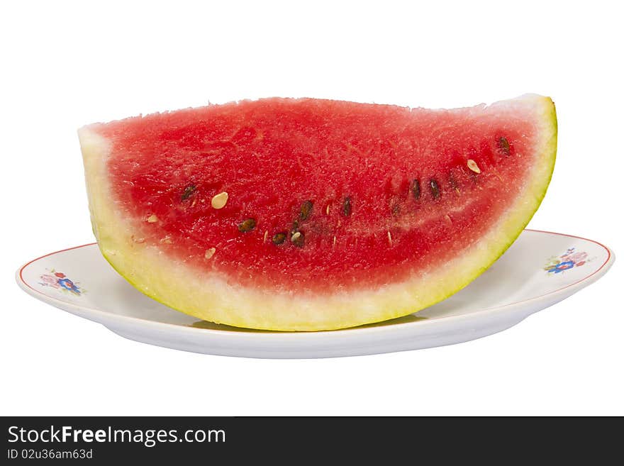 Watermelon on plate isolated on white background