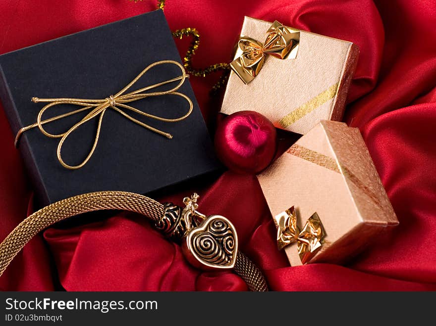 Gifts on a red background. Studio Shot. Gifts on a red background. Studio Shot.