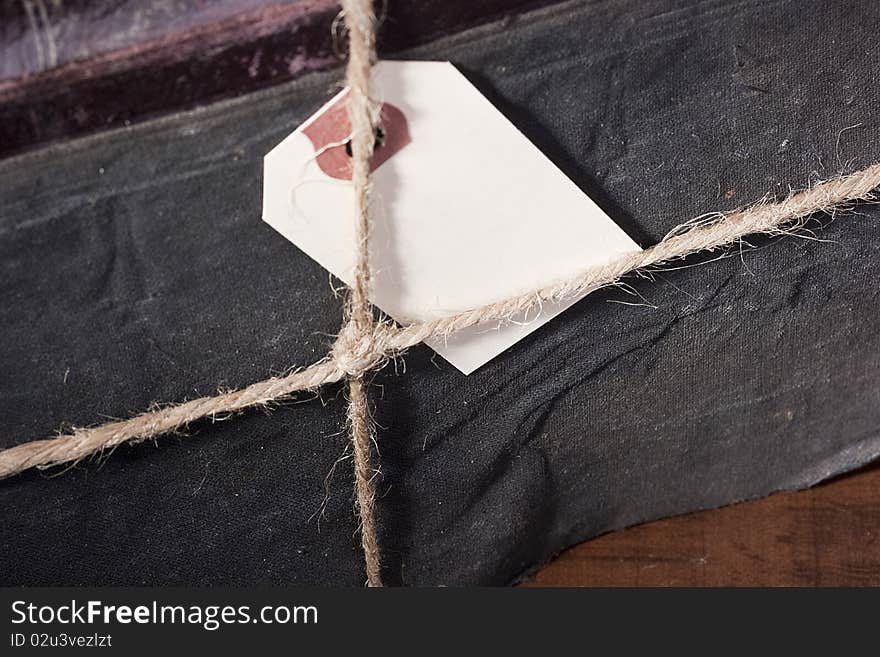 Archival book in a book-depository are tied up by a cord. Archival book in a book-depository are tied up by a cord.