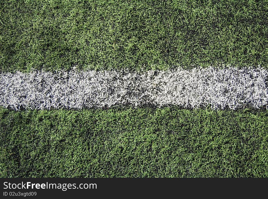 Line on artificial soccer pitch. Line on artificial soccer pitch.