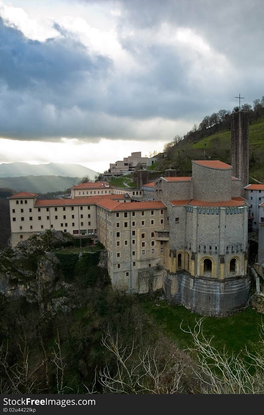 The Sanctuary of Arantzazu near Onati (Basque Country, Spain) at cloudy skies