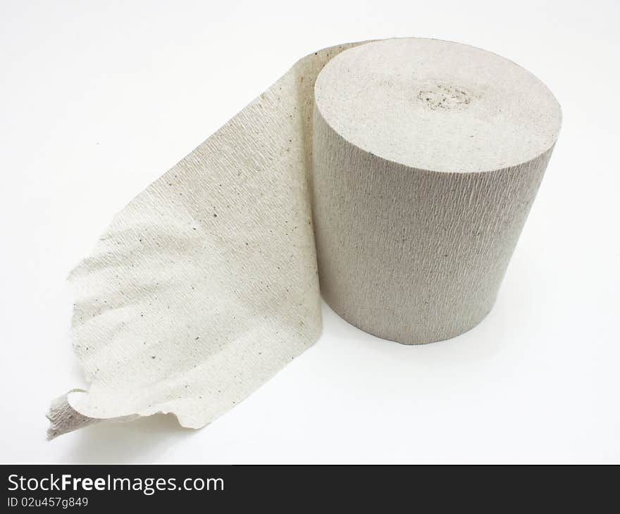 White roll of toilet paper isolated on white material;