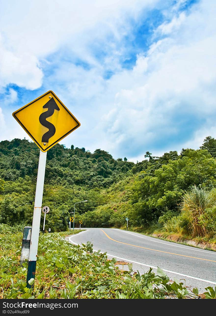 Sign of curve road on mountain