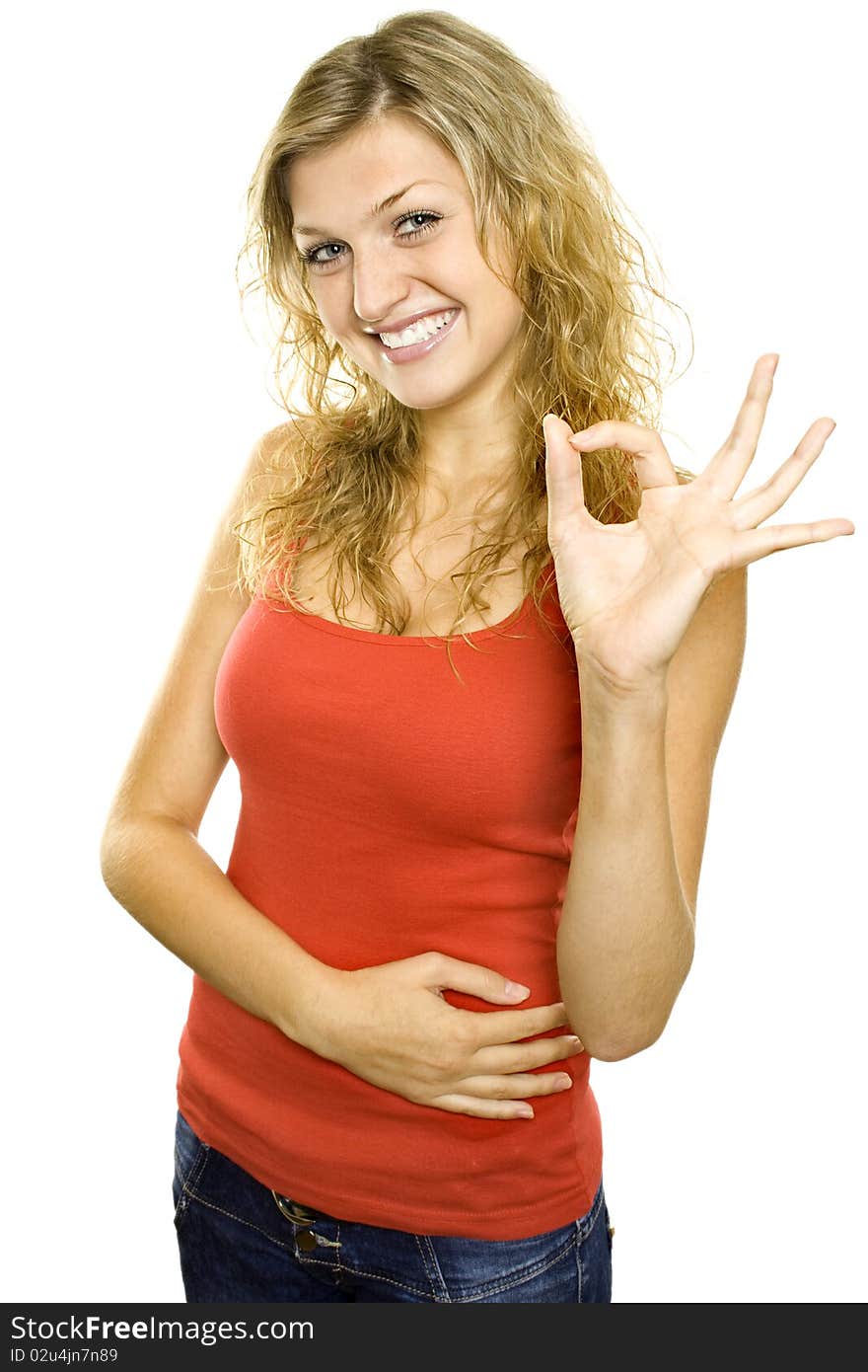 Young beautiful red girl ok gesture isolated on white. Young beautiful red girl ok gesture isolated on white